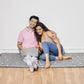 Flexi Lightweight Travel Friendly Slim Mattress - Grey - Couple Sitting with Laptop - Duroflex