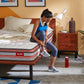 NRG 20 – Pocket Spring Memory Foam Mattress - Girl tying shoelaces - Duroflex