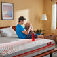 NRG 40 - Memory Foam Mattress with Anti Stress Fabric - Boy on Bed - Duroflex