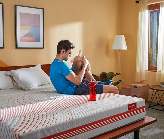 NRG 40 - Memory Foam Mattress with Anti Stress Fabric - Boy on Bed - Duroflex